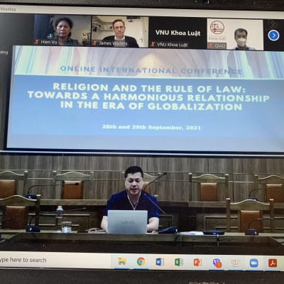 Prof. Dang Minh Tuan of VNU Law School moderates panel 3 from the conference site in Hanoi.