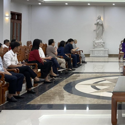 Training program participants visit a Catholic Church.