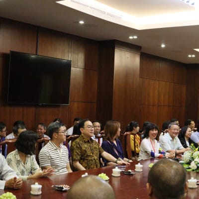 Program participants hear from the leaders of a local Buddhist temple.