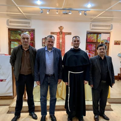 IGE Senior Fellow Wade Kusack meets with members of the Catholic Church in Fergana