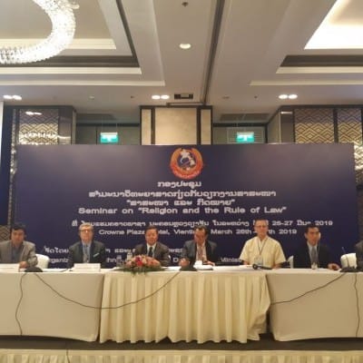 Panel discussion featuring Lao and foreign speakers
